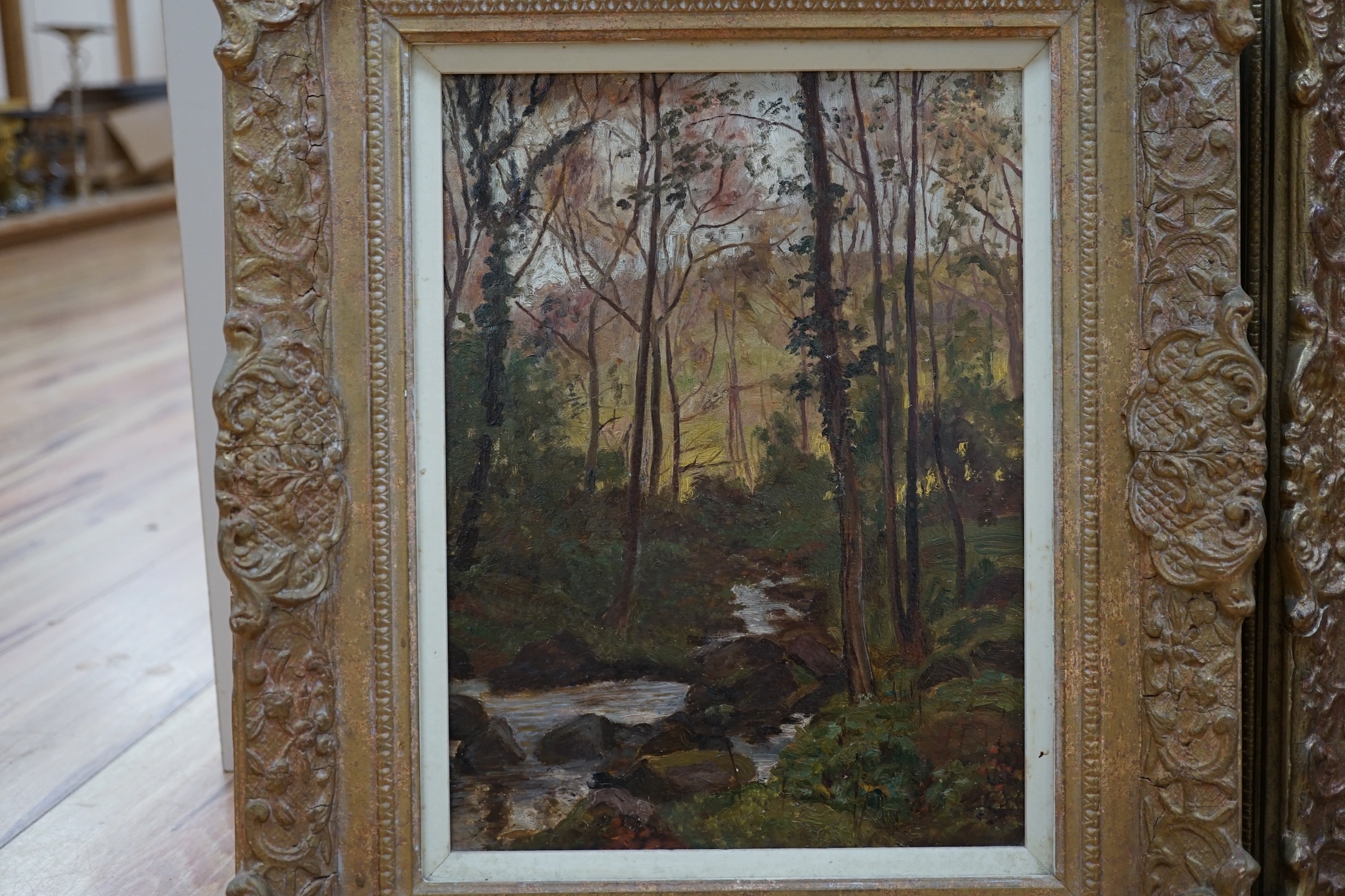 20th century English School, near pair of oils on canvas, Wooded landscapes with streams, 29 x 22cm. Condition - fair to good